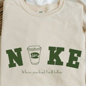Cream Graphic Tee with Green Nike inspired Gilmore girls saying